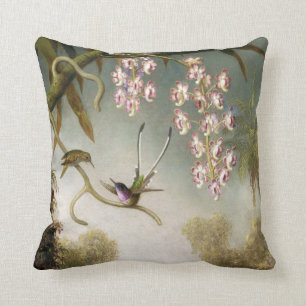 Orchidées de jet avec le coussin de colibri