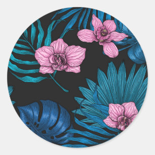 Orchids and palm leaves, pink and blue on black classic round sticker