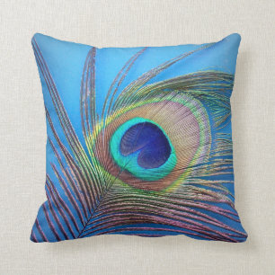 Oreiller accentué bleu avec plume de paon