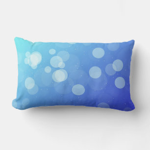 Oreiller bleu avec un design à dégradé abstrait