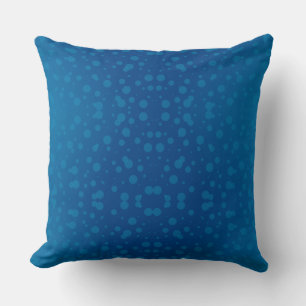 Oreiller bleu avec un motif de cercles turquoise