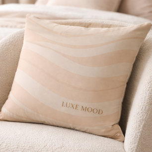 Oreiller décoratif beige rose ondulé