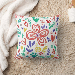 Oreiller jeté à motif floral et empreinte de patte