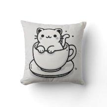 Oreiller jeté avec un chat mignon dans une tasse à