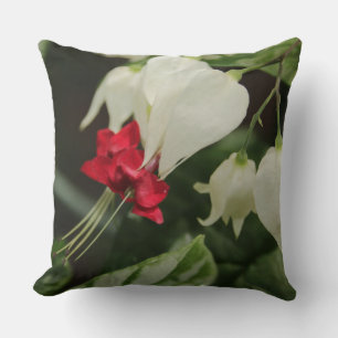 Oreiller lumineux rouge vif fleur tropicale blanch