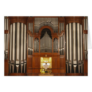 Organist at organ console