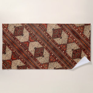 Oriental carpet pattern in orange and cream  beach towel