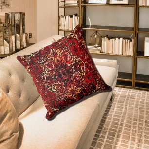 Oriental rug design in dark red throw pillow