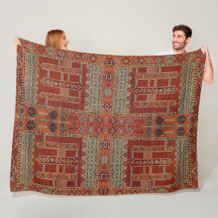 Oriental rug design in orange fleece blanket