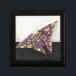 Origami Butterfly on Floral Paper Gift Box<br><div class="desc">Float like a butterfly with this beautiful origami piece by Chariklia Zarris. A lovely floral print paper was used to create the origami butterfly,  and the purples,  yellows,  and greens simply leap off the piece. Buy your copy today!</div>