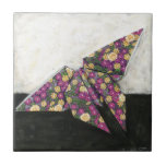 Origami Butterfly on Floral Paper Tile<br><div class="desc">Float like a butterfly with this beautiful origami piece by Chariklia Zarris. A lovely floral print paper was used to create the origami butterfly,  and the purples,  yellows,  and greens simply leap off the piece. Buy your copy today!</div>