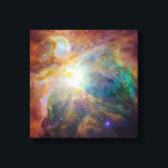 Orion Nebula Astronomy Photo Canvas Print<br><div class="desc">A bright and colourful outer space photo of the orion nebula. Turquoise yellow and orange ethereal plasma gases with luminous highlights create a colourful composition.</div>
