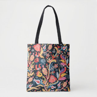 ornamental floral pattern with birds on a dark bac tote bag
