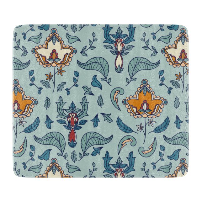 Ornate floral pattern on a pale blue background cutting board (Front)