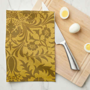 Ornate gold floral pattern with symmetrical kitchen towel