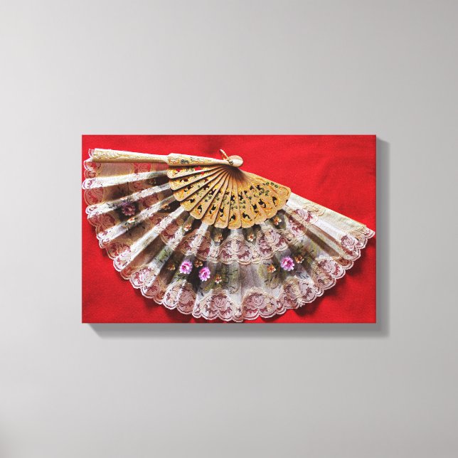 Ornate Hand Held Fan on a Red Background Canvas Print (Front)
