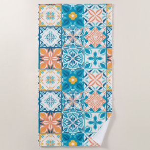 Ornate tiles in blue and orange beach towel