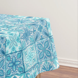 Ornate tiles in blue and white tablecloth