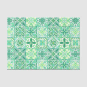 Ornate tiles in green and white tissue paper