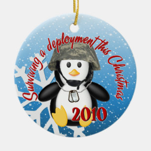Ornement 2010 de pingouin de déploiement de survie