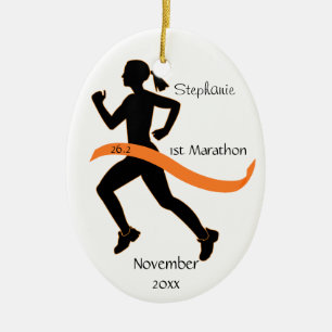 Ornement de marathonien de femme dans l'orange