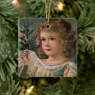 Ornement En Céramique Ange tenant un petit sapin de Noël illuminé par de