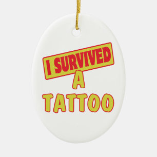 ORNEMENT EN CÉRAMIQUE J'AI SURVÉCU À UN TATOUAGE