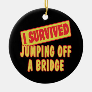 ORNEMENT EN CÉRAMIQUE J'AI SURVÉCU DE JOUER D'UN PONT