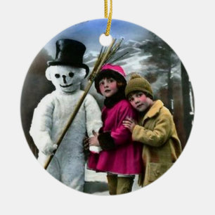 ORNEMENT EN CÉRAMIQUE LES ENFANTS AVEC LA NEIGE