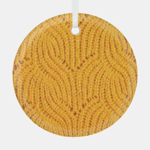 Ornement En Verre Chandail en tricot orange, arrière - plan texturé.