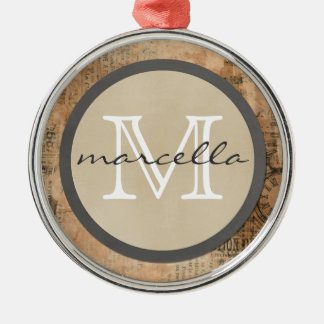 Ornement Métallique Vieux monogramme vintage déchiré de journal