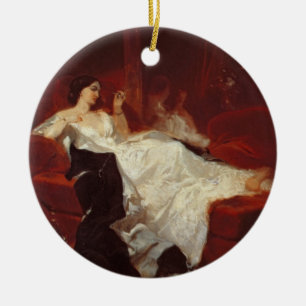 Ornement Rond En Céramique Femme sur un sofa rouge