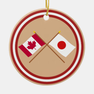 Ornement Rond En Céramique Le Canada et les drapeaux croisés par Japon
