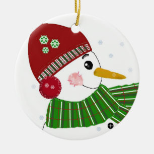 Ornement Rond En Céramique Snowman en Casquette rouge et écaille verte