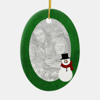 Ornement vert de bonhomme de neige de cadre