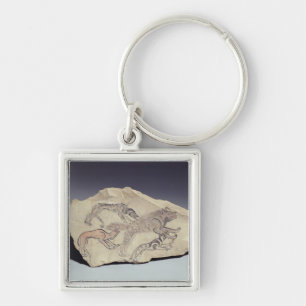 Ostracon depicting a dog chasing a hyena (limeston keychain