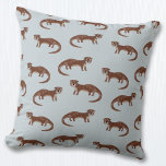 Otter Throw Pillow<br><div class="desc">A cute and suspicious looking otter pattern on a duck egg blue background for wildlife lovers. Original art by Nic Squirrell.</div>