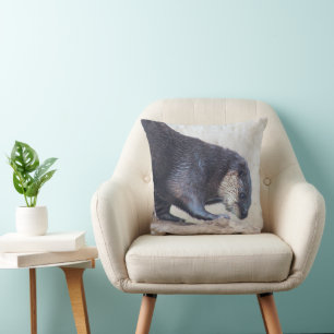 Otterly sleek throw pillow