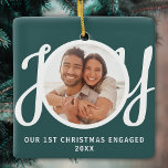 Our 1st Christmas Engaged Photo Green Keepsake Ceramic Ornament<br><div class="desc">This keepsake First Christmas Engaged photo ornament is decorated with the word JOY in stylish script typography on a green background. Easily customizable.</div>