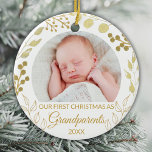 Our First Christmas As Grandparents Gold Photo Ceramic Ornament<br><div class="desc">This elegant Grandparents Christmas Ornament is decorated with gold foliage on a white background.
Easily customizable with baby's photo and year.
Original Watercolor © Michele Davies.</div>