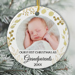 Our First Christmas As Grandparents Gold Photo Ceramic Ornament<br><div class="desc">This elegant Grandparents Christmas Ornament is decorated with gold foliage on a white background.
Easily customizable with baby's photo and year.
Original Watercolor © Michele Davies.</div>