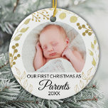 Our First Christmas As Parents Photo Gold Foliage Ceramic Ornament<br><div class="desc">This elegant Parents' Christmas Ornament is decorated with gold foliage on a white background.
Easily customizable with baby's photo and year.
Original Watercolor © Michele Davies.</div>