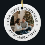 Our First Christmas at New Address – Round Photo Ceramic Ornament<br><div class="desc">Celebrate a new chapter with a white round ceramic ornament featuring an arched “OUR FIRST CHRISTMAS” headline, your street line along the bottom, and a soft brush-edge photo window. Split year digits sit neatly at the sides for balance. Update the address, drop in your photo, and set the year to...</div>