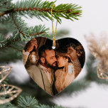 Our First Christmas Elegant Rose Gold Couple Photo Ornament<br><div class="desc">Elegant heart-shaped holiday ornament for a couple's first Christmas together features a photo on the front and custom text with snowflake design accent on the back. Rose gold / blush pink background color and fonts can be customized.</div>