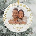 Our First Christmas Engaged Gold Foliage Photo Ceramic Ornament<br><div class="desc">This elegant Engagement Christmas Ornament is decorated with gold foliage on a white background.
Easily customizable with your photo and year.
Original Watercolor © Michele Davies.</div>