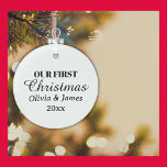 Our First Christmas Names Year Keepsake Glass Ornament<br><div class="desc">Capture the moment of your first Christmas together with our CUSTOM "Our First Christmas" Couple's Names and Year Keepsake Glass Ornament. Personalized just for you, this enchanting ornament beautifully commemorates the start of your journey as Newlyweds, making every holiday season a cherished celebration of love and togetherness. A timeless keepsake...</div>