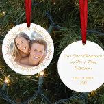 Our First Christmas Photo Gold Flower Frame Ceramic Ornament<br><div class="desc">Personalized photo ornament with your custom text on the back. The sample wording reads "Our First Christmas as Mr & Mrs [your last name]" followed by "[your first names and year]". The template is set up for you to customize and, for example, you could change the wording to "Our First...</div>