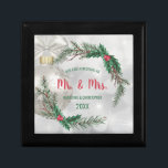 Our First Christmas | Pretty Wreath Mr. & Mrs Gift Box<br><div class="desc">Celebrate your first year of life together with this precious "Our First Christmas" gift box. This design features a pretty silver background with a white Christmas ornament and a white ribbon. Above it, there is a elegant wreath with pine branches and mistletoe berries. The customizable text reads "Our first Christmas...</div>