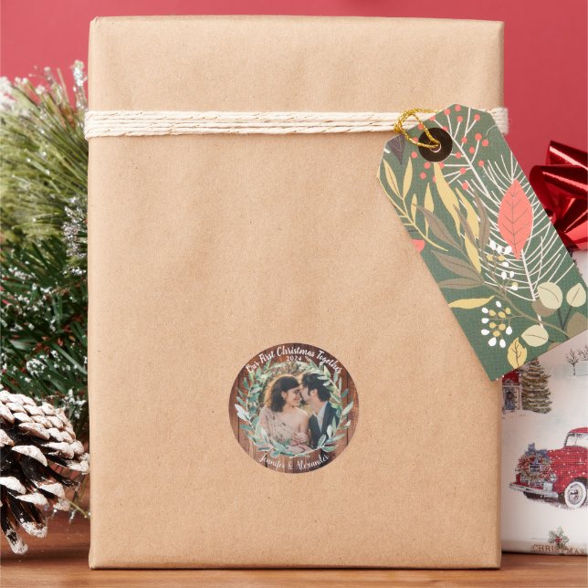 Our first christmas together rustic wood photo classic round sticker (Holiday)
