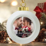 Our First Christmas Wedding Photo White Script Ceramic Ball Christmas Ornament<br><div class="desc">Our First Christmas Wedding Photo Ornament</div>